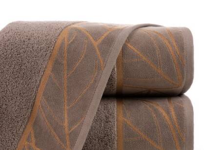 Ręcznik bawełniany 50x90 ALISMA 2 brązowy z welwetową bordiurą ze wzorem dużych liści Limited Collection