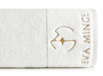 Ręcznik bawełniany 70x140 GAJA Eva Minge kremowy z welwetową bordiurą sygnowaną logo projektantki