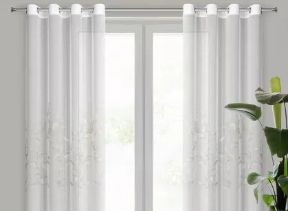 Firana na przelotkach 140x250 ESTELLA biała z etaminy ze srebrnym motywem roślinnym