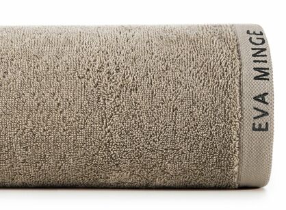 Ręcznik 30x50 VENUS Eva Minge beżowy zdobiony bordiurą w kolorze ręcznika z napisami projektantki