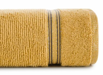 Ręcznik 70x140 FILON musztardowy zdobiony bordiurą w prążki z połyskującą srebrną nicią