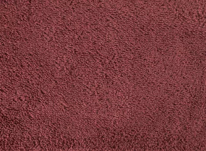 Ręcznik 70x140 VENUS Eva Minge ceglany zdobiony bordiurą w kolorze ręcznika z napisami projektantki