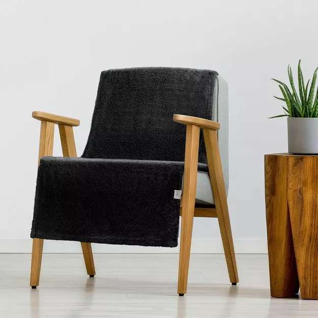 Koc na fotel 70x160 LORI czarny puszysty jednokolorowy z kolekcji Design 91
