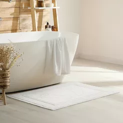 Dywanik bawełniany 50x70 SAMMY biały jednokolorowy z wzorem stóp