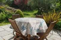 Obrus na taras 140x220 GARDEN 14 miętowy wodoodporny z beżowym wzorem liścia bananowca - 6