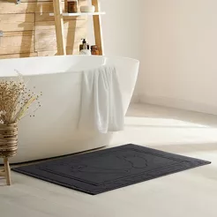 Dywanik bawełniany 50x70 SAMMY czarny jednokolorowy z wzorem stóp