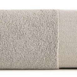 Ręcznik bawełniany 50x90 NESSY beżowy szeroką żakardową bordiurą w geometryczny wzór przetykaną błyszczącą nicią 